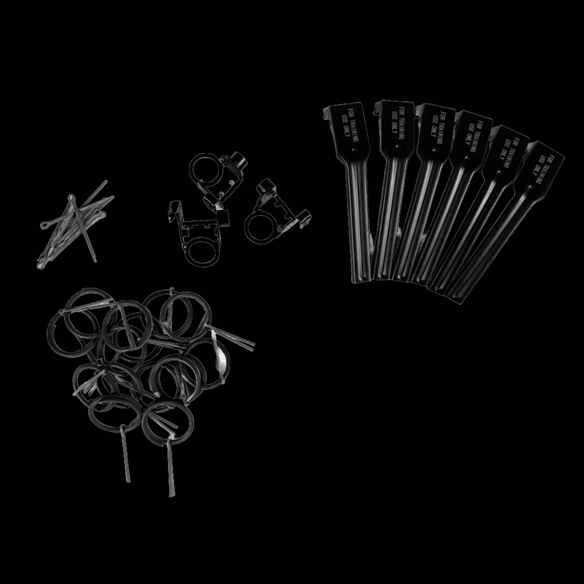Training flashbang refill parts kit including replacement spoons, pins, and safety clasps for reusable training devices